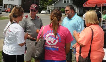 Students and their families attend President's Drop-In