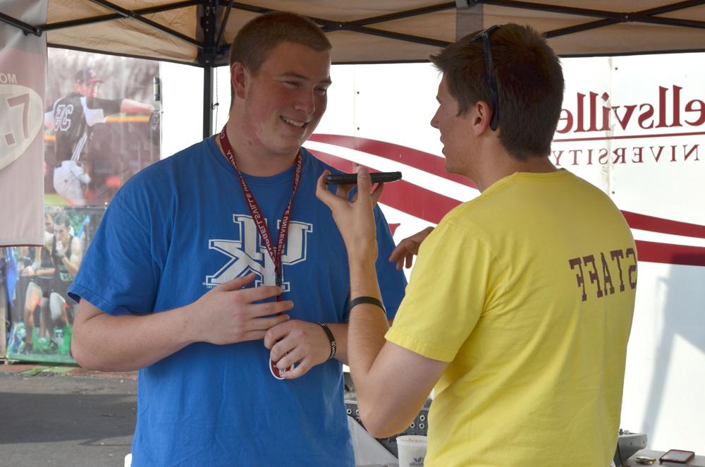 Alan Haven (left), production assistant, interviews Rick Raley (right) for WLCU Radio. (Campbellsville University photo by Drew Tucker)