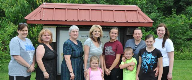 At Campbellsville University’s Outdoor Classroom Institute were from left: Blaire Bland of Campbellsville University; Tara Burkhead of Washington County Middle School with her daughter MaKenzi and son Landon in front of her; Kelsea McCoy of CU; Marcia Sharp of Campbellsville Elementary with her daughter Alexis in front of her; Brenda Tungate, associate professor of biology at CU and OCI director; Belinda Wilkins-Smith, environmental educator; and Amy Young of Calvary Elementary. (Campbellsville University Photo by Saman