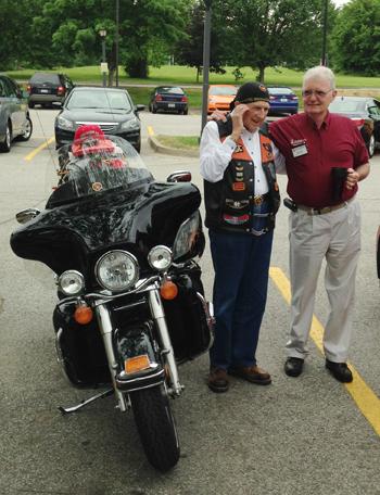 B.J. Senior, left, of LaGrange, wished Dr. E. Bruce  Heilman well.