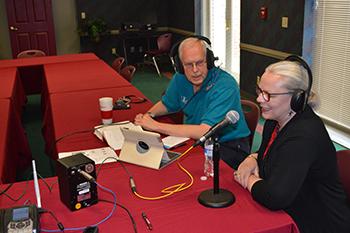 Rande Swann, left, adjunct instructor in public relations, and Dr. Chris Conver, assistant professor of theology, discuss the NBC television series “AD The Bible Continues” on a live WFIA Louisville talk show “Ask Joyce” with Joyce Oglesby from the Louisville Education Center. 