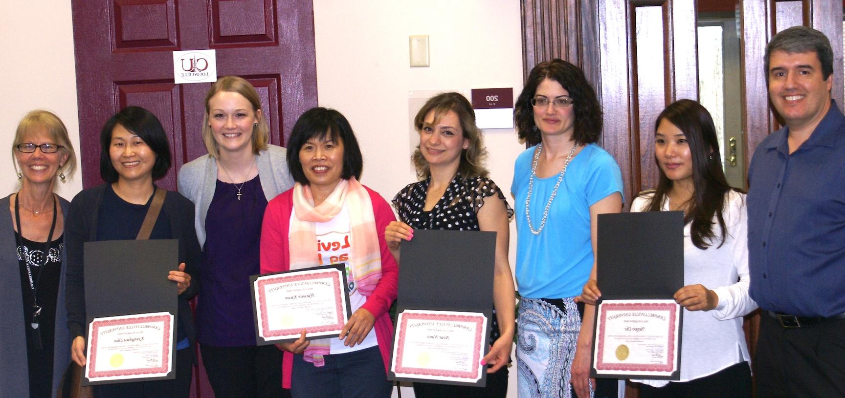 English as a Second Language (ESL) students at Campbellsville University's Louisville Education Center received their certificates of completion April 30. From left are: instructor Eduardo Trindade, Yunjoo Cho, assistant director of ESL, Ardeen Top, student Nour Nano, student Hyesoon Kwon, CU alumna and former adjunct ESL teacher Ashley Boyd, Kyunghwa Choi and instructor Joy Hagan. For more information about the ESL program in Louisville, call (502) 753-0264. (Campbellsville University photo provided by the Louisville Education Center)